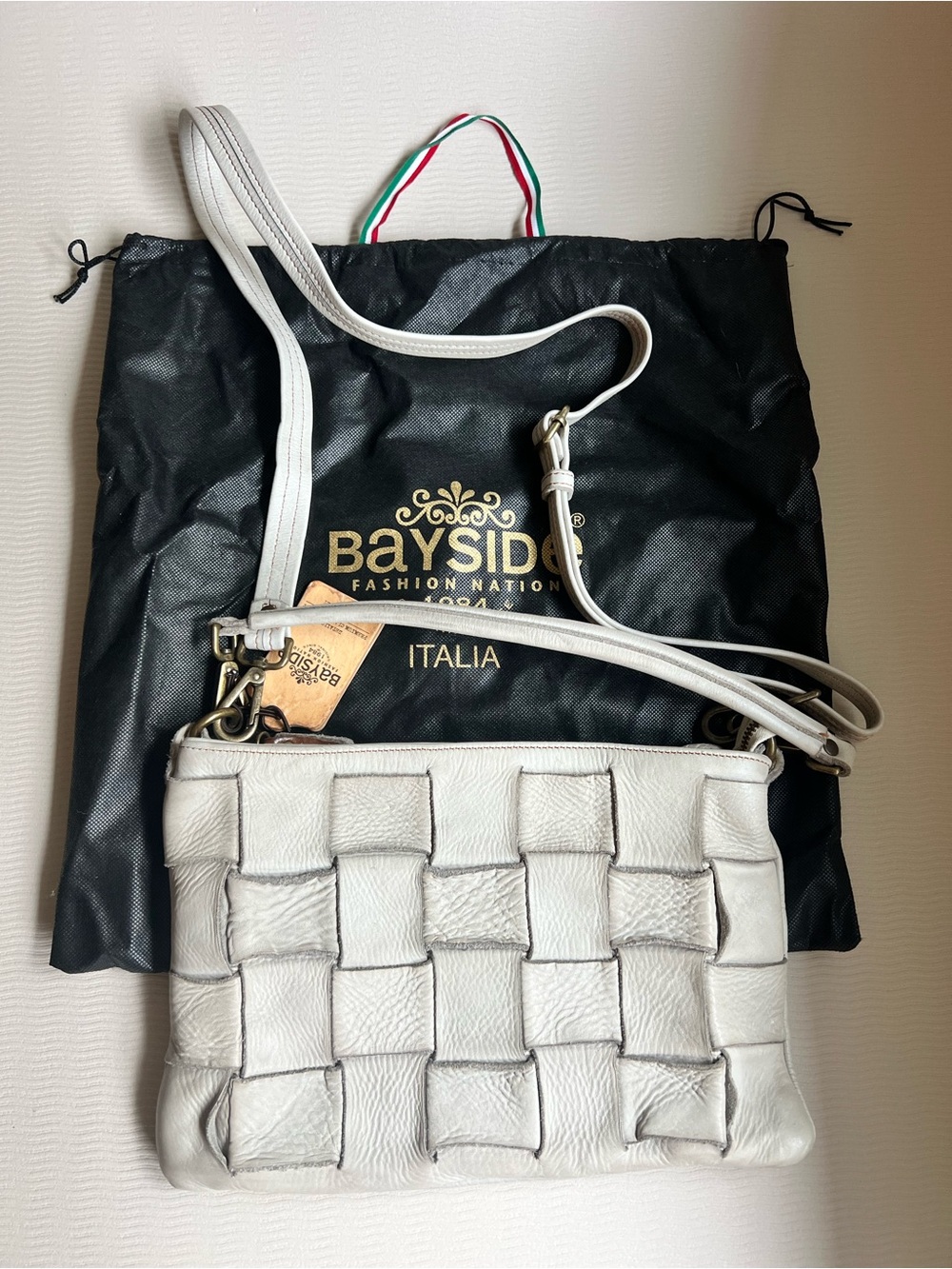 Italian leather crossbody with adjustable shoulder strap bag in ice color NWT